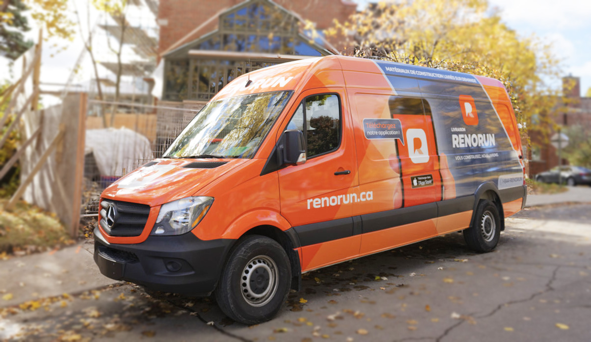 A RenoRun truck parked on a street